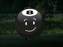 a pool ball with the number 8 on it is smiling