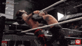 two men are wrestling in a ring with the words combatclashpdx on the bottom