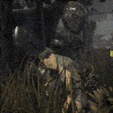 a blurred image of a person with a yellow tag on their back that says ' a ' on it