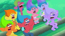 a group of trolls with their mouths wide open