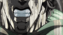 a close up of a person 's face with their mouth open and tears coming out of it .