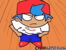 a cartoon boy wearing a red hat and blue shorts is standing on a wooden floor .