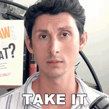 a man says take it in front of a book