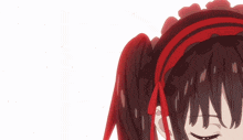 a close up of a girl with her eyes closed and red hair