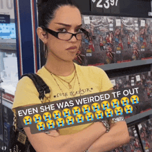 a woman wearing glasses and a yellow t-shirt that says cote razor