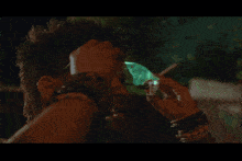 a man wearing a pair of glow in the dark goggles