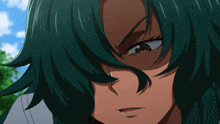 a close up of a girl with green hair making a funny face