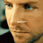 a close up of a man 's face with the word autism written over it .