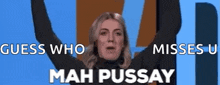a woman with her arms in the air and the words guess who misses u mah pussy