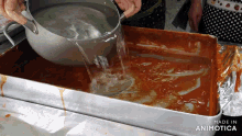 a person pouring water into a pan with the words made in animotica below it