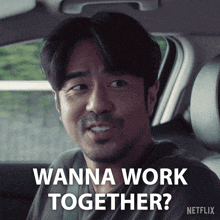a man in a car says " wanna work together " on a netflix ad