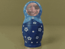three russian nesting dolls with faces painted on them