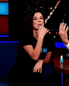 Millie Bobby Brown Nails GIF - Millie Bobby Brown Nails Blue Nails GIFs