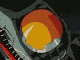 a close up of a cartoon character 's helmet with a yellow and orange lens .