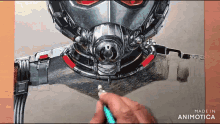 a drawing of an ant man is being made by animatica