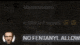 a man wearing headphones is standing in front of a fire and a sign that says no fentanyl allow .