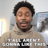 a man in a hoodie says y'all aren t gonna like this