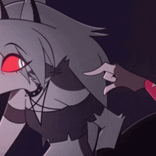 a cartoon character with red eyes is being touched by someone 's hand