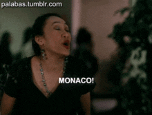 a woman is laughing and the words noble affair are on the screen
