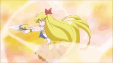 a girl in a sailor moon outfit is holding a sword .