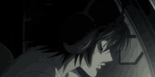 l from death note is sitting in a car with headphones on .