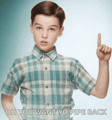 a boy in a plaid shirt is pointing up with the words oh you want yo pipe back below him
