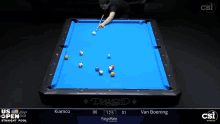 a pool table with a blue cloth that says diamond