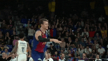 a basketball player with the number 6 on his shirt