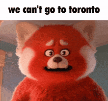 a red teddy bear with the words we can 't go to toronto on the bottom