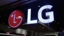 an lg sign that is lit up in a store