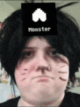 a person with a sticker on their head that says monster on it