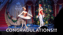 a nutcracker and a ballerina on a stage with the words congratulations