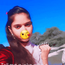 a girl with a smiley face on her nose and the words tell me a joke about