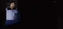 a video game screen shows a man playing a game at 2 am