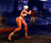 a woman in a bikini is dancing in a video game while a man stands behind her .