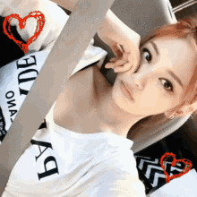 a woman wearing a white t-shirt that says bride on it