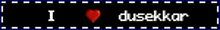 a sign that says i love dusekkar with a heart in the middle