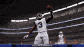 a football player for the dallas cowboys throws a ball