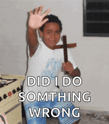 a boy holding a cross with the words " didi do somthing wrong " below him