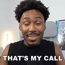 a man with a beard says that 's my call in front of a microphone