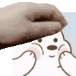 a close up of a person 's hand on a cartoon character 's face .