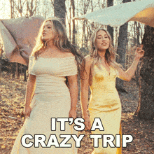 two women in white and yellow dresses with the words it 's a crazy trip behind them