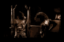 a woman in a leopard print dress is standing in the dark in a dark room .