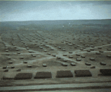 an aerial view of a large military base with a lot of buildings