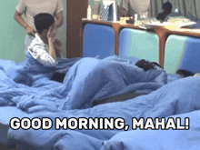 a man standing next to a bed with the words good morning mahal