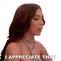 a woman with red hair and a necklace says " i appreciate that "