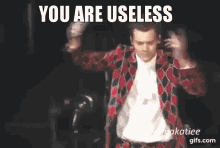 You Are Useless Harry Styles GIF - You Are Useless Harry Styles GIFs
