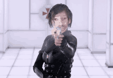a person holding a gun in front of a sign that says umbrella corp