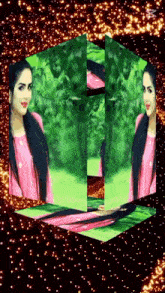 a woman in a pink shirt is surrounded by trees and a cube