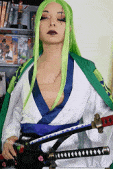 a woman in a green wig is holding a samurai sword and has the hashtag #dofdumplings on her sleeve